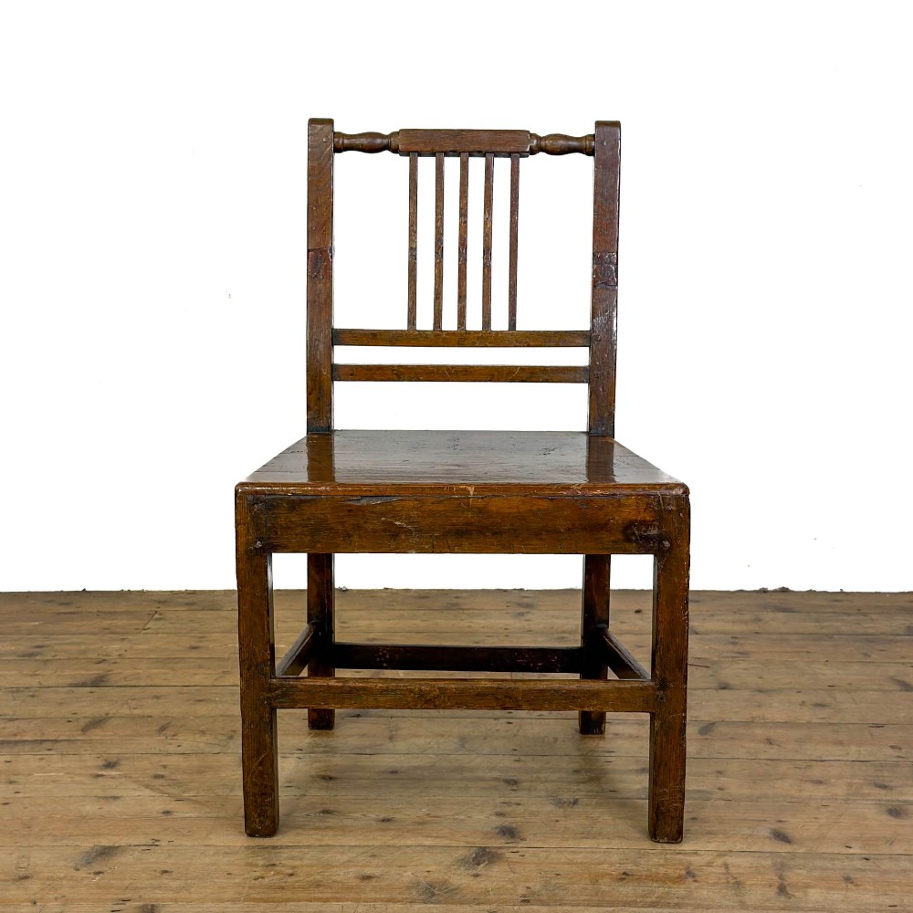 A set of three dark oak farmhouse dining chairs featuring vertical slat backs, solid wooden seats, and sturdy square stretchers. View IV
