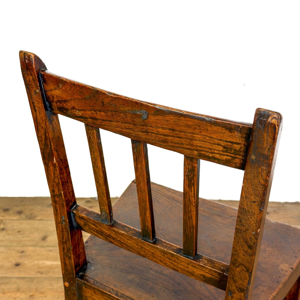 A set of three dark oak farmhouse dining chairs featuring vertical slat backs, solid wooden seats, and sturdy square stretchers. View VII