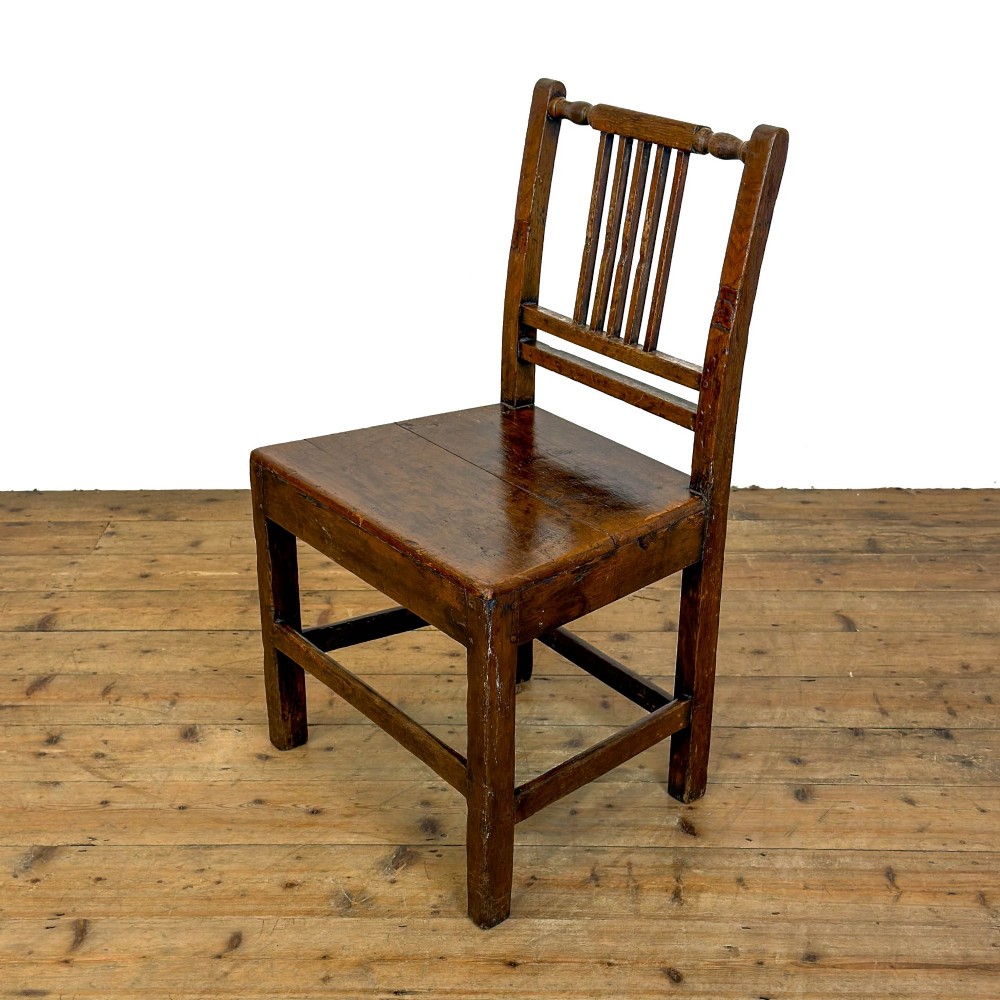A set of three dark oak farmhouse dining chairs featuring vertical slat backs, solid wooden seats, and sturdy square stretchers. View VIII
