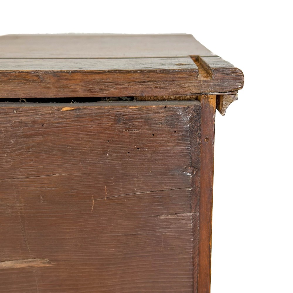 An antique oak dresser base featuring two drawers with brass backplate handles, shaped lower aprons, turned front legs, and an open potboard shelf. View VIII