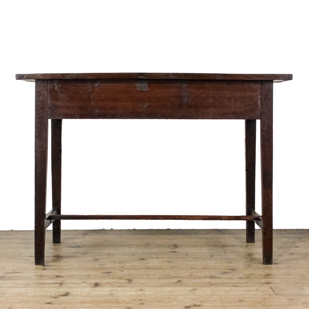 An antique dark oak kitchen table featuring a rectangular top, an end drawer with a brass knob, straight legs, and a low H-stretcher base. View VIII