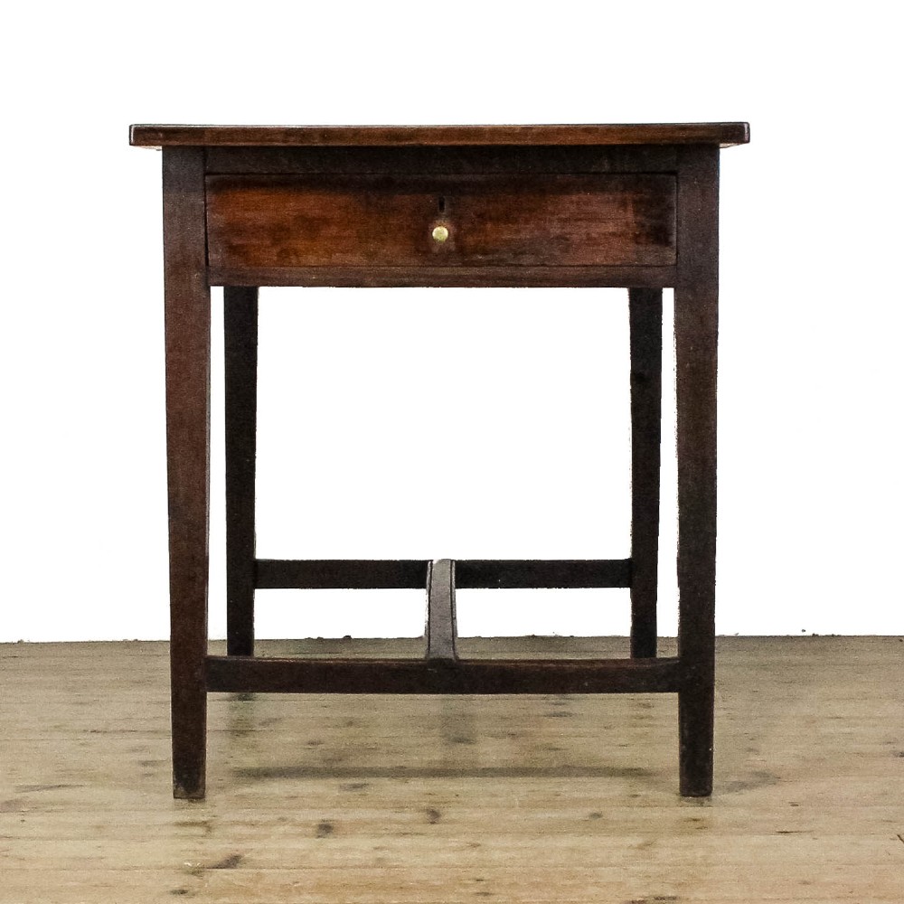 An antique dark oak kitchen table featuring a rectangular top, an end drawer with a brass knob, straight legs, and a low H-stretcher base. View IX