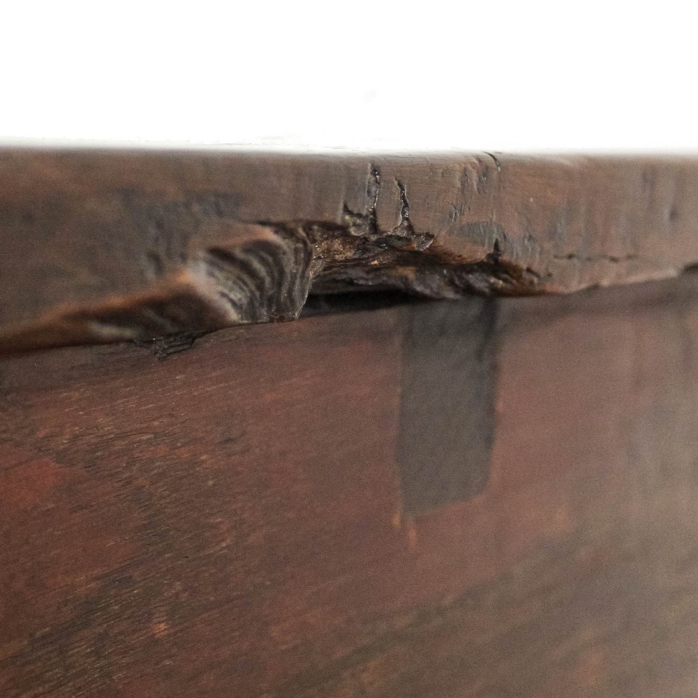 An antique dark oak kitchen table featuring a rectangular top, an end drawer with a brass knob, straight legs, and a low H-stretcher base. View XII