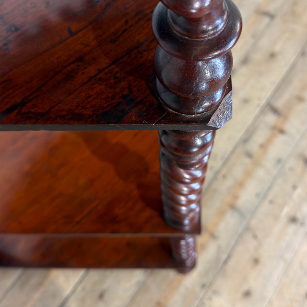 A four-tier Victorian mahogany corner whatnot featuring open shelving supported by barley twist columns and topped with a pierced fretwork pediment. View IV
