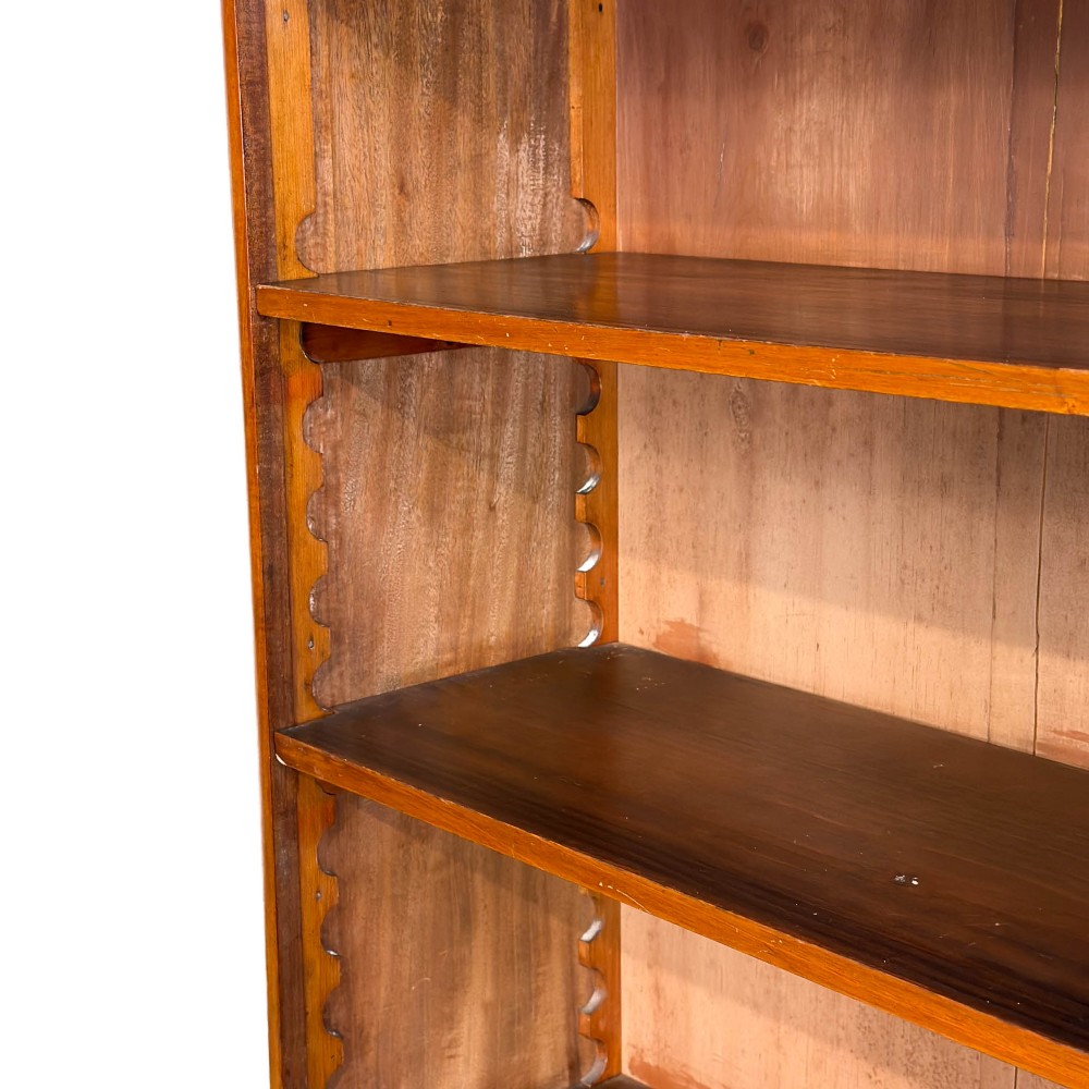 A small antique open mahogany bookcase featuring four tiers of shelving and a galleried top upstand. View VII