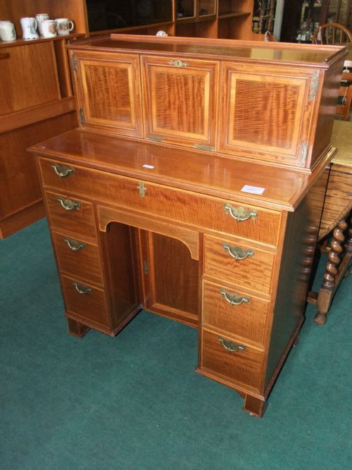 An Edwards & Roberts Satinwood Banded Mahogany Desk,
