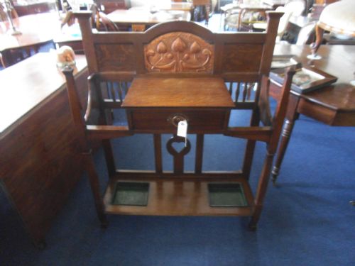 Arts and Crafts Stick Stand, by Shapland and Petter.
