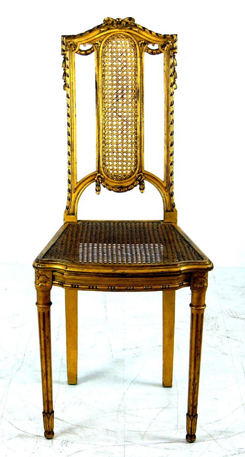 A Stunning Carved and Gilded Bedroom Chair