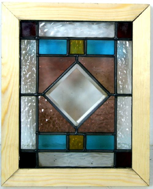 A Set of 4 Multi Coloured Stained Glass Windows