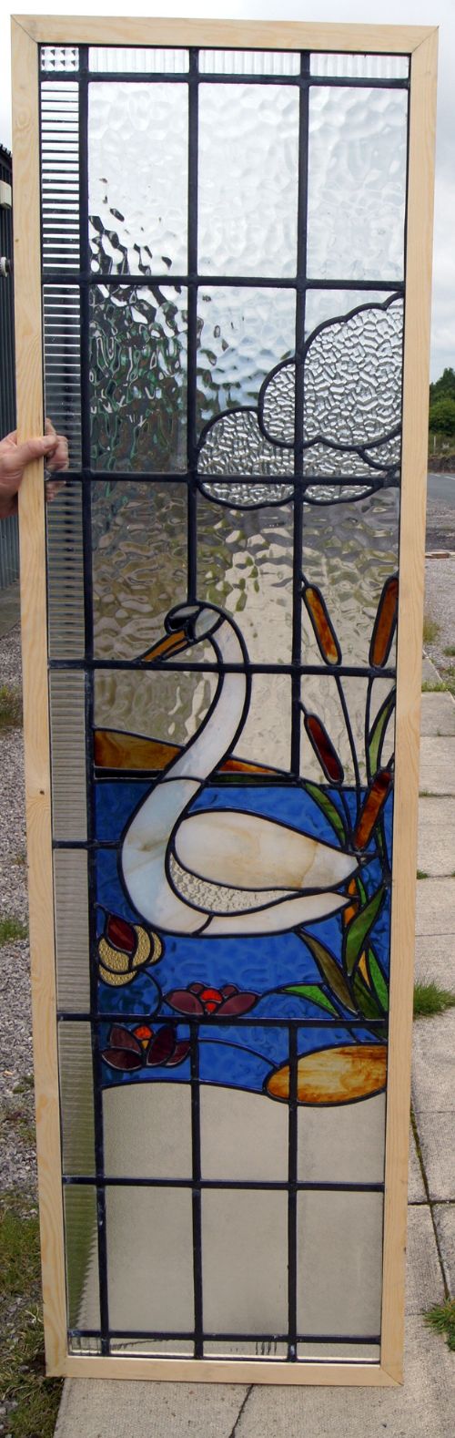 A Stunning Pair of Art Deco Windows Depicting Swans Swimming