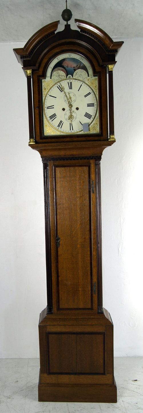 A Good 8 Day Oak Rolling Moon Grandfather Clock
