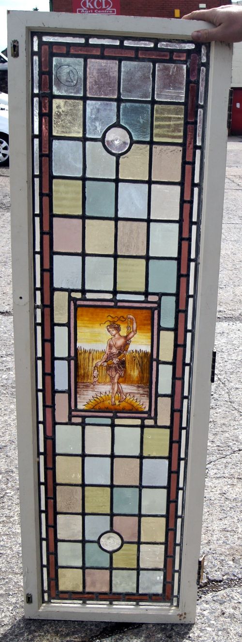A Good Victorian Set of Four Leaded and Painted Glass Four Seasons