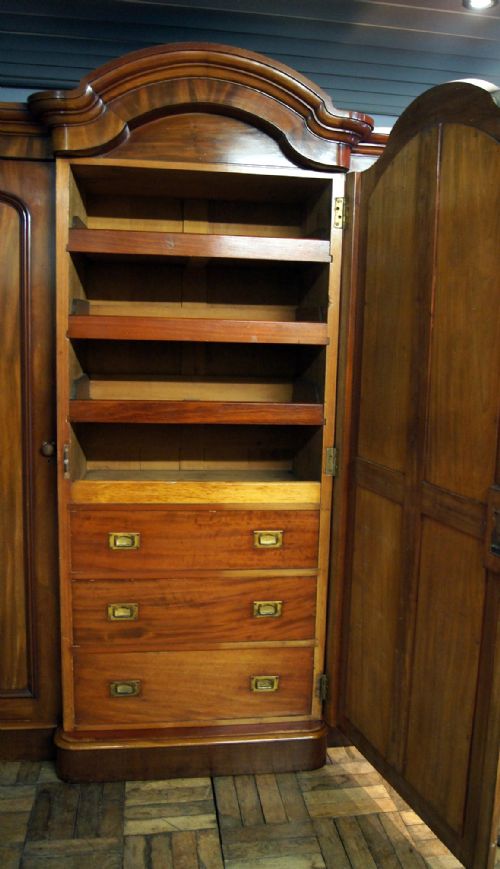 A Good Quality Mahogany Breakfront Triple Robe