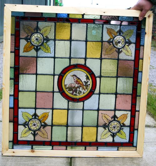 A Stunning Pair of Painted Leaded Glass Bird Windows
