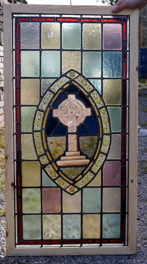 A Great Painted Window of a Celtic Style Cross