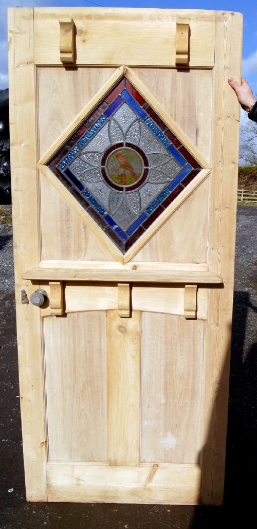 A Fabulous Stained Glass Front Door with Painted Bird Centre