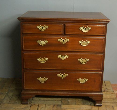 A Petite George III Mahogany Inlaid Chest of Drawers