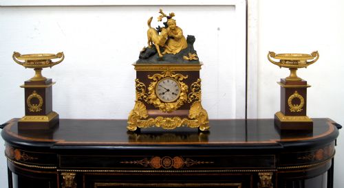 A Gilt Bronze and Brown Patinated 3 Piece 19th Century French Clock Set
