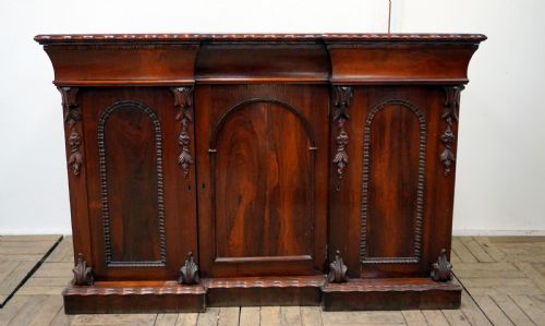 A Petite Rosewood Inverted Breakfront Chiffonier
