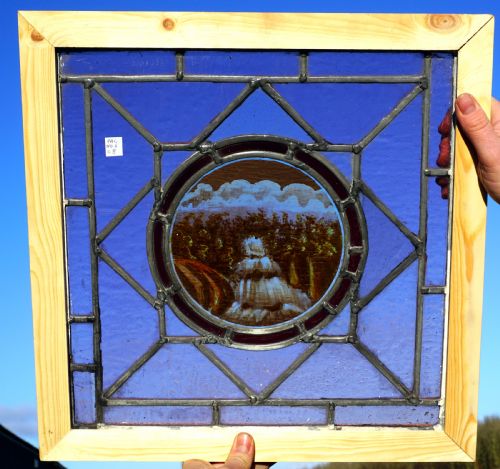 A Painted Leaded Glass Window of a Waterfall
