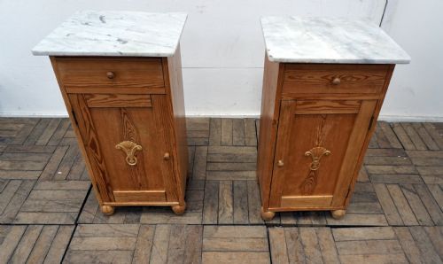 A Pair of Continental Marble Top Pine Bedside Cabinets