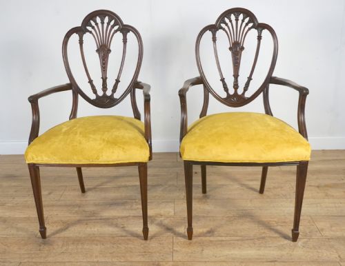 An Exceptional Pair of Antique Mahogany Arm/desk Chairs