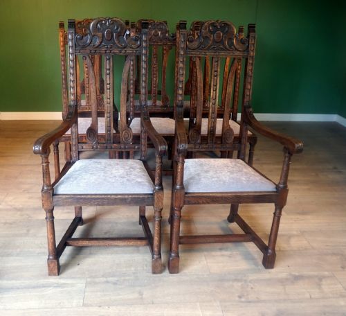 A Good Substantial Set of 8 Solid Oak Carved Chairs