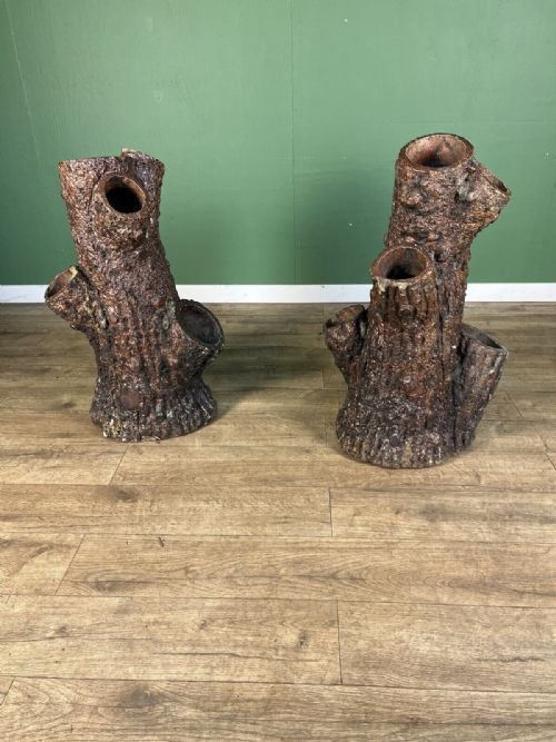 An Exceptional Pair of Salt Glazed Faux Bois Strawberry Planters