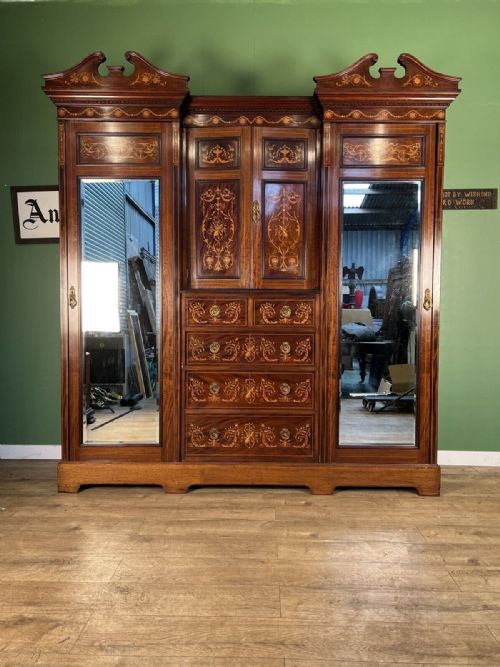 A Stunning Inlaid Antique Combination Wardrobe