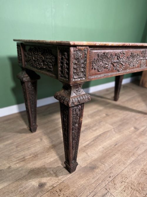 AN ITALIAN CARVED FRUITWOOD CENTRE TABLE - ADDITIONAL PHOTO 1