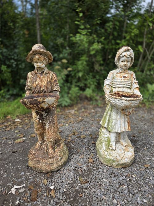 PAIR OF EARLY 20TH CENTURY CAST IRON BOY AND GIRL STATUES - ADDITIONAL PHOTO 1