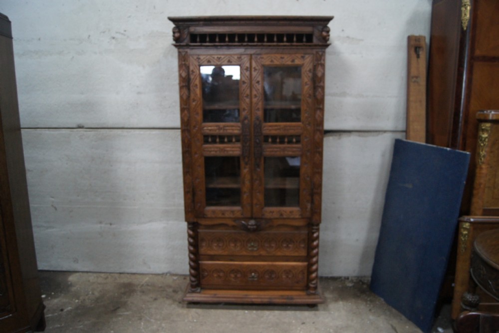 Unusual French carved oak cupboard