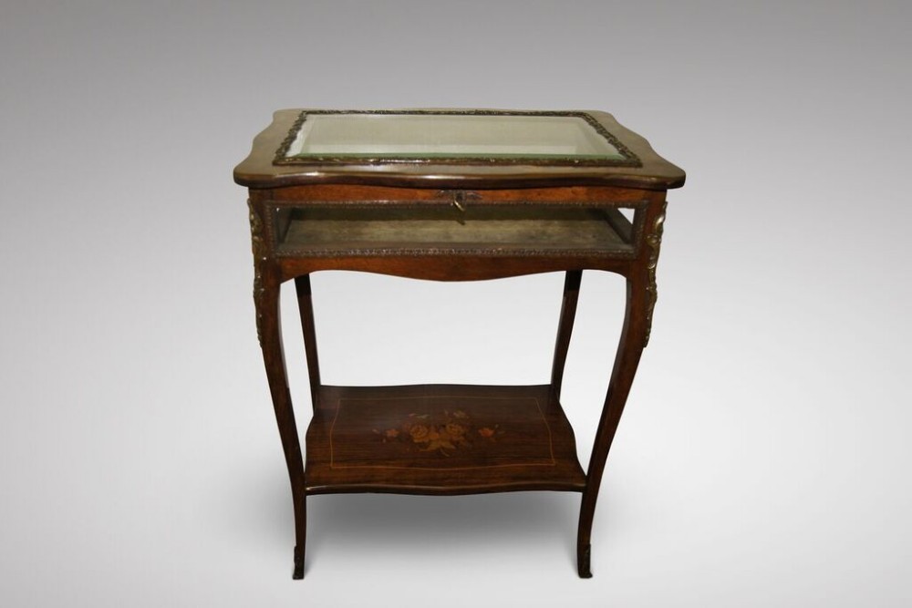 A fine rosewood bijouterie cabinet 
