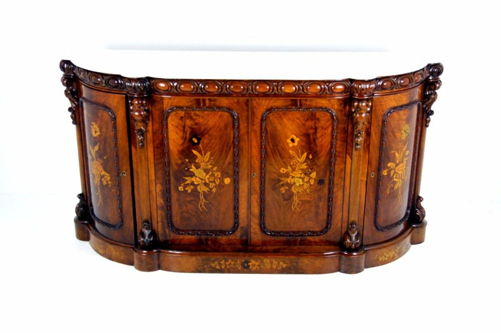 A fine figured Walnut Victorian marble top credenza 