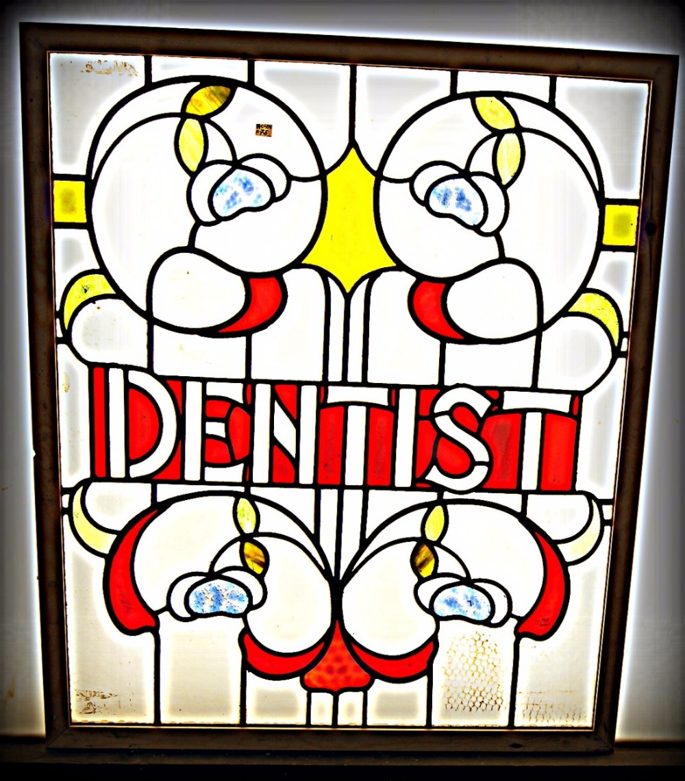 Two original dentist leaded glass windows
