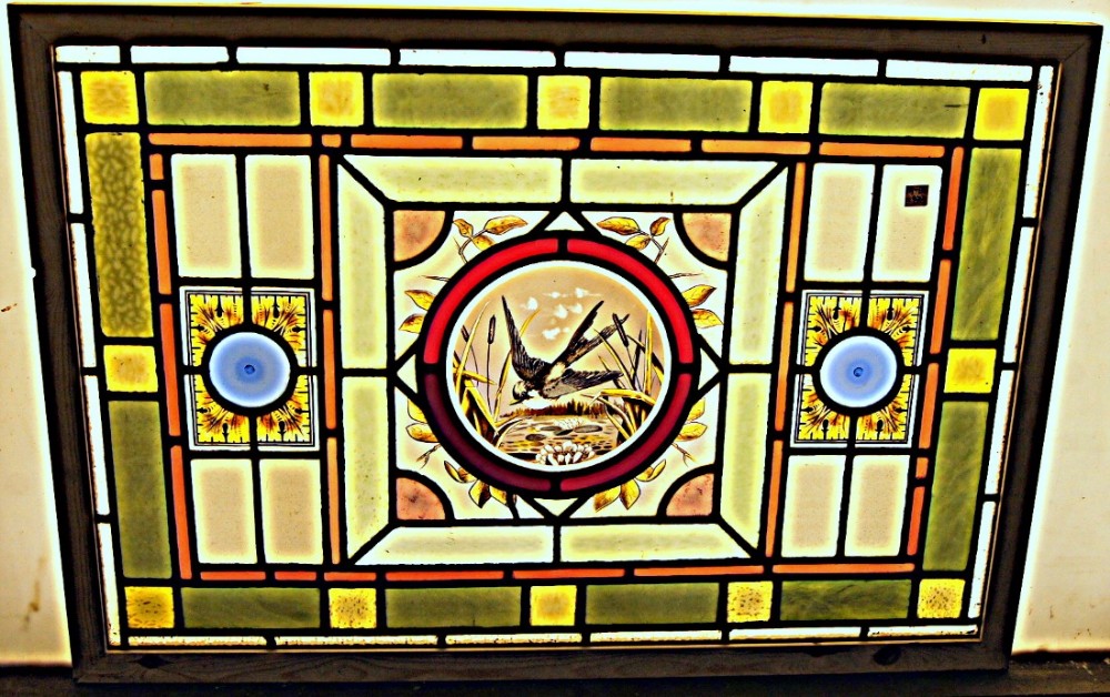 A stunning Victorian painted bird window 