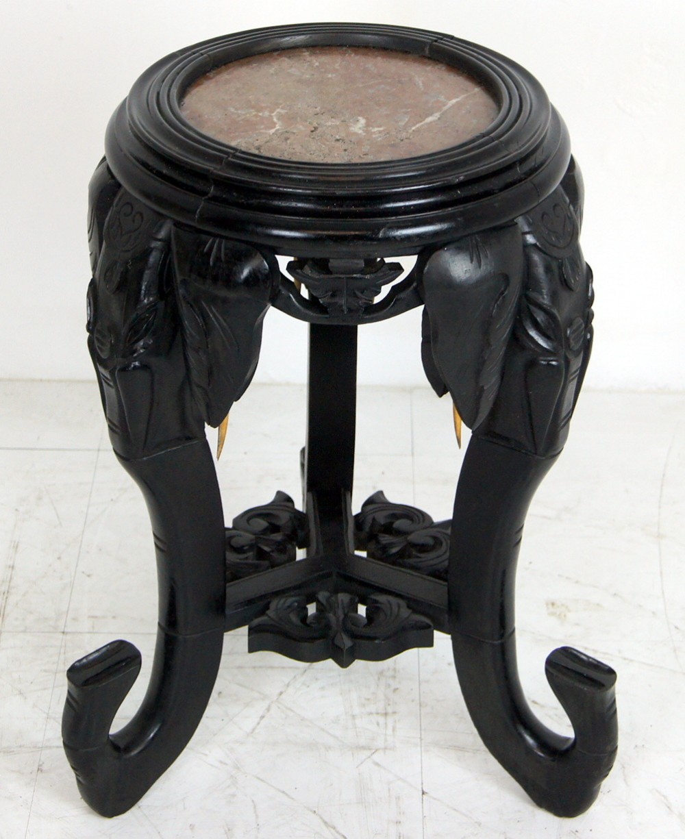 A decorative and unusual marble top planter
