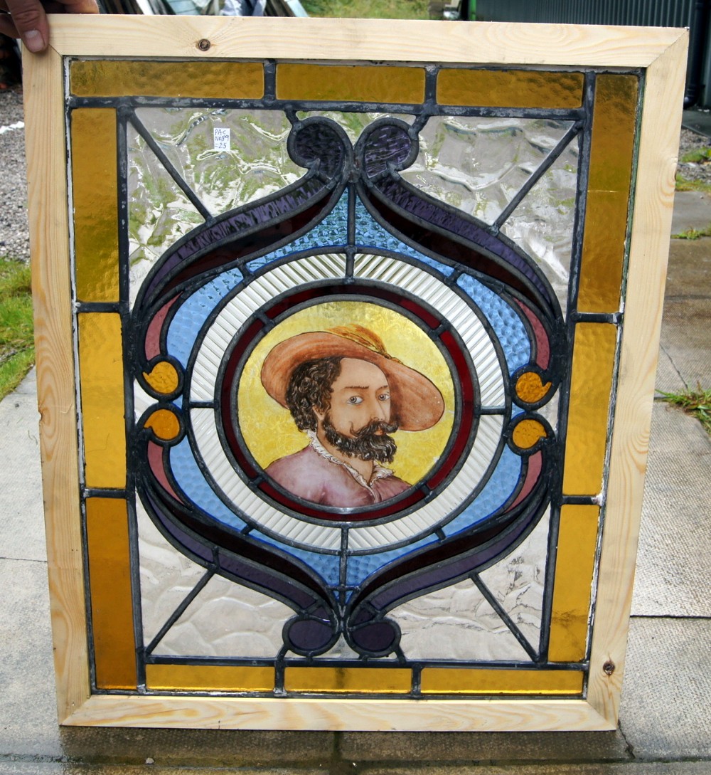 A leaded and painted glass window of Walter Raleigh