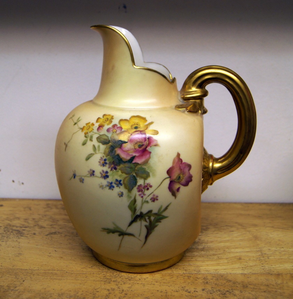 A good Royal Worcester flat back blush ivory jug