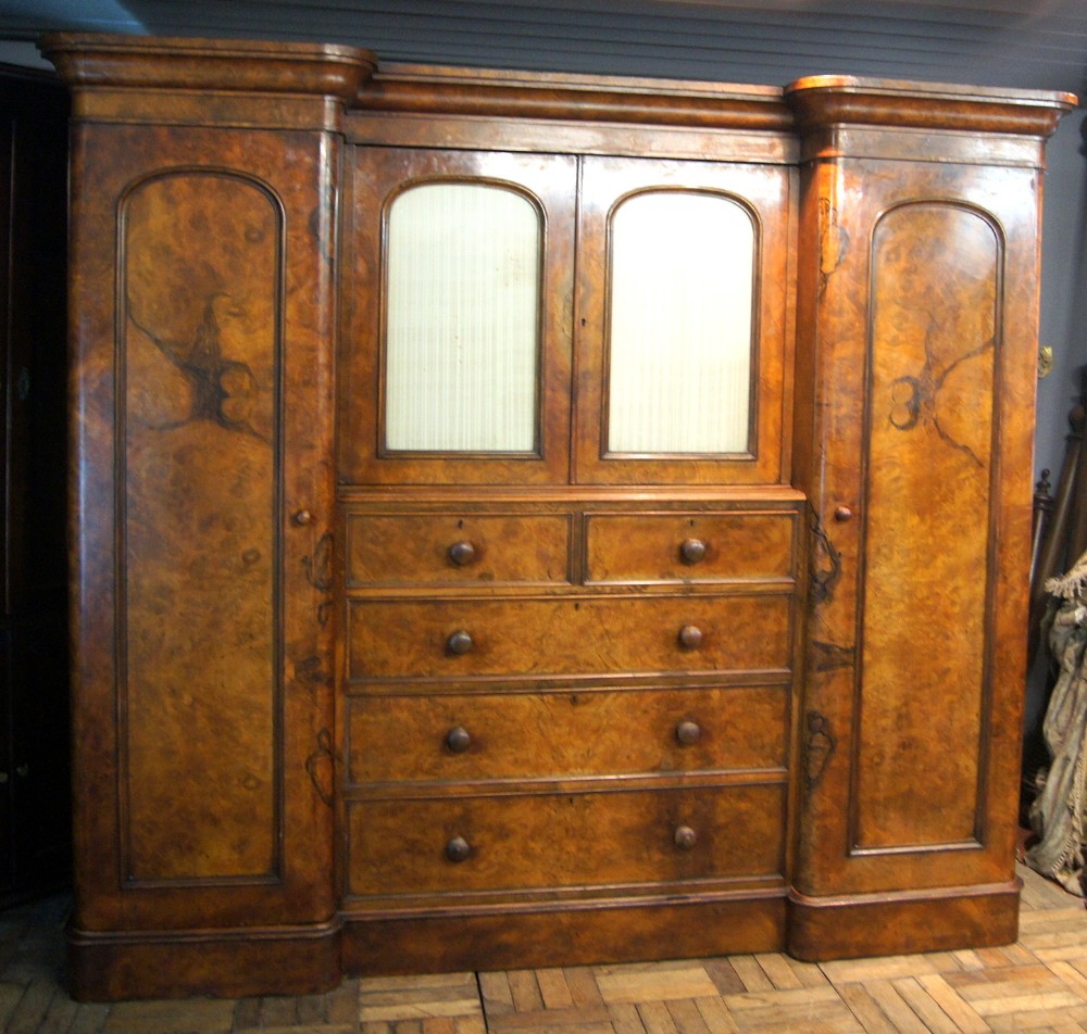 A Victorian Breakfront Compactum Wardrobe in Burr and fine figured Walnut