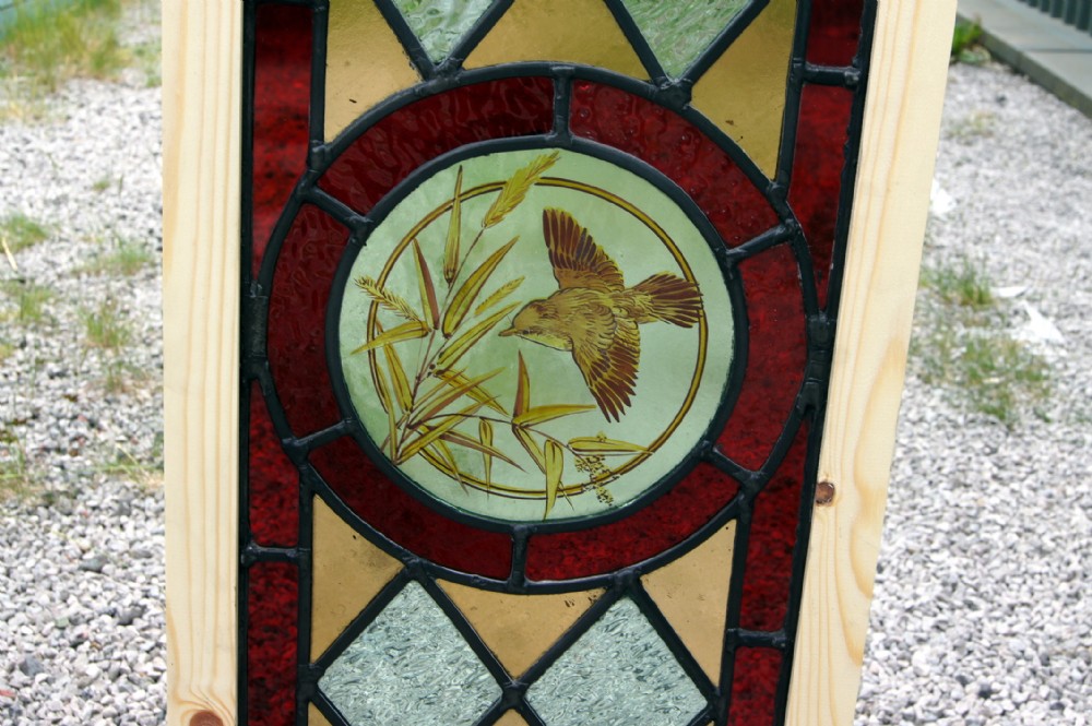 Good late Victorian painted window of a bird in flight 
