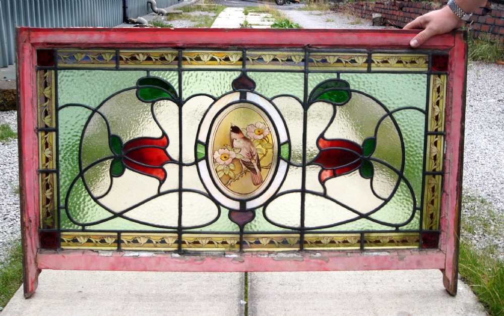 A great art nouveau painted leaded glass window