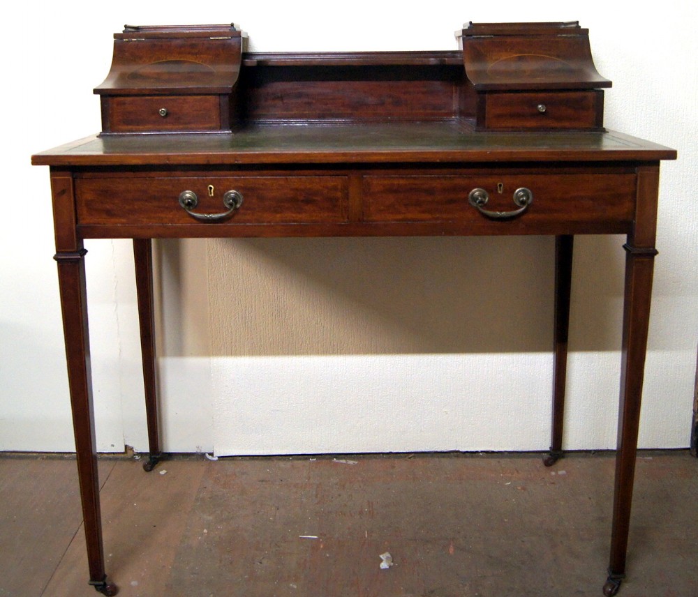 A great Carlton style mahogany writing desk 
