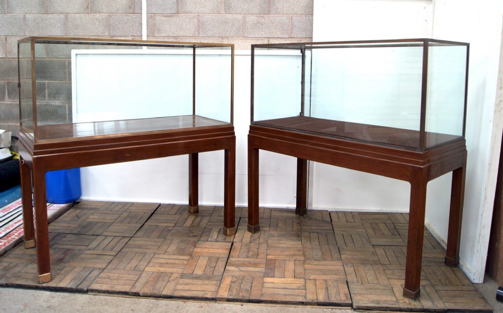 An excellent pair of bronze and mahogany museum cabinets
