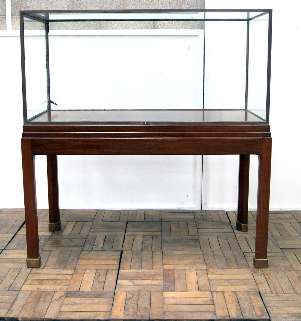 A great sized bronze and mahogany museum cabinet 