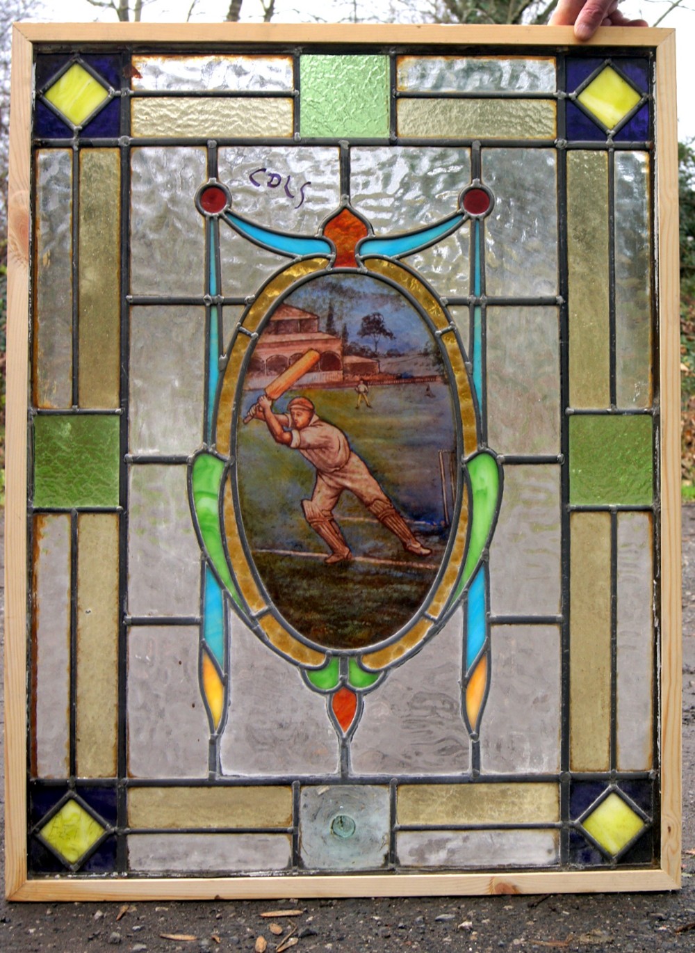 A very rare stained glass painted window of a cricket scene