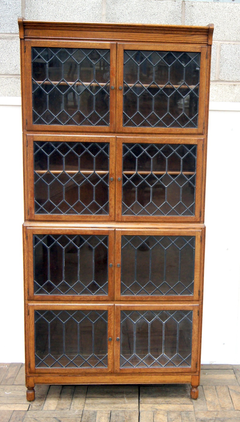 A good solid oak stacking 4 section solicitors bookcase