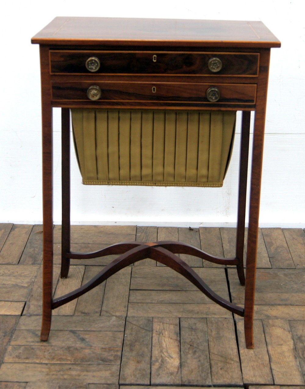 A charming Victorian rosewood inlaid work table