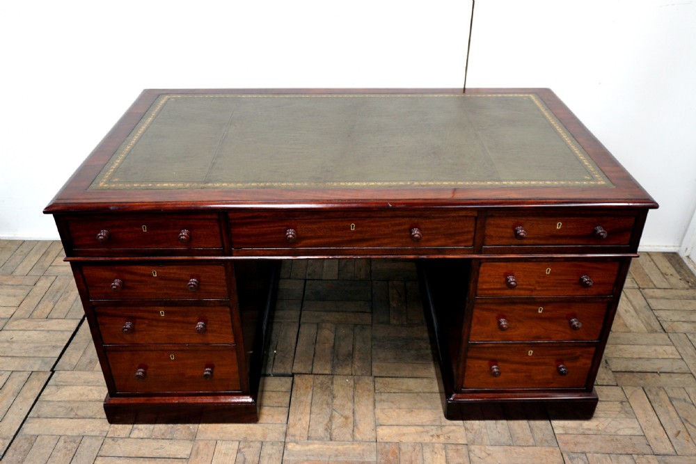 A superb Victorian mahogany pedastal desk View II