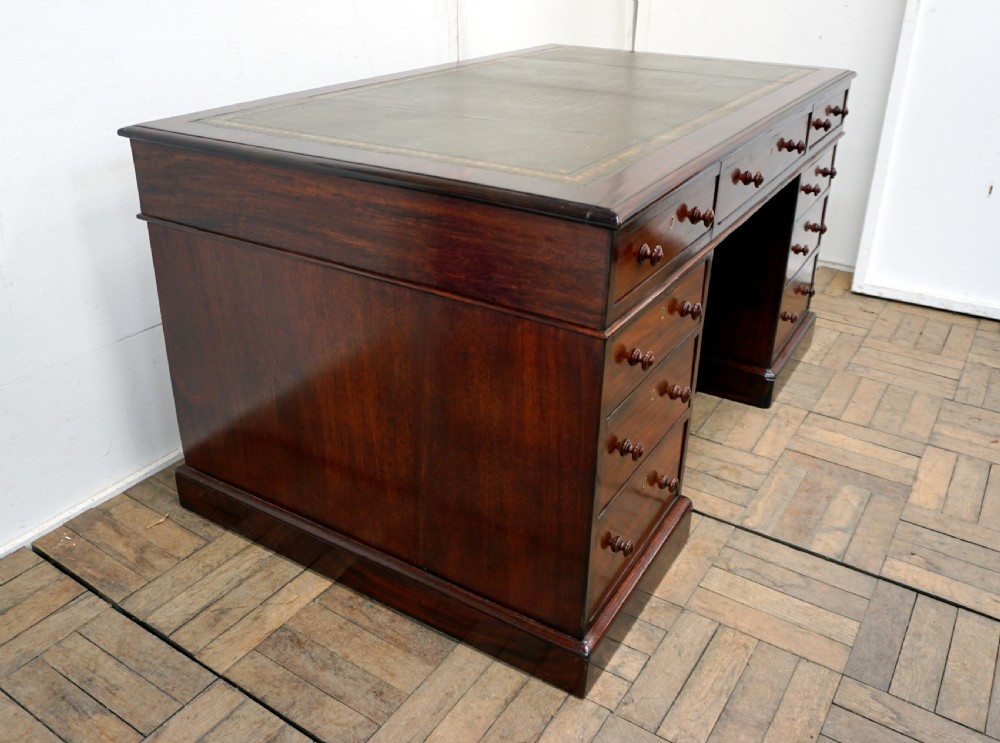 A superb Victorian mahogany pedastal desk View III